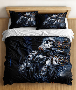 An abstract, artistic depiction of a Stormtrooper helmet dissolving on a black duvet cover.