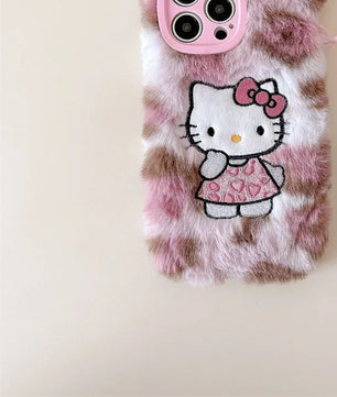 Lusy Store Luxury winter fluffy hand warmer Plush Leopard Hello Kitty phone case for iPhone 16 15 14 13Pro Max Cartoon KT Furry Wrist Strap 