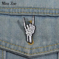 Halloween Skeletal Hand Enamel Pins Custom Rock and Roll Gesture Brooches Lapel Badges Punk Gothic Jewelry Gift for Kids Friends