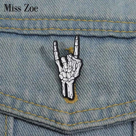 Halloween Skeletal Hand Enamel Pins Custom Rock and Roll Gesture Brooches Lapel Badges Punk Gothic Jewelry Gift for Kids Friends