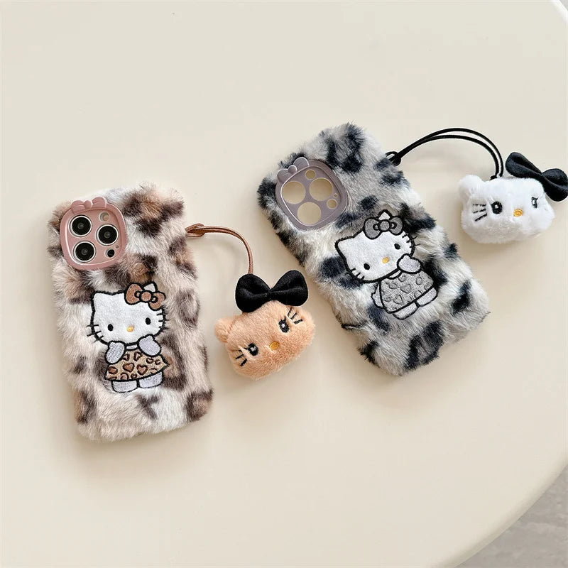 Lusy Store Luxury winter fluffy hand warmer Plush Leopard Hello Kitty phone case for iPhone 16 15 14 13Pro Max Cartoon KT Furry Wrist Strap 
