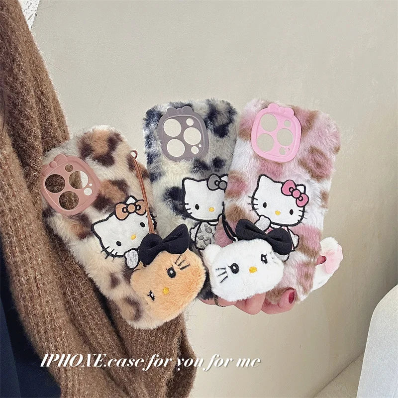 Lusy Store Luxury winter fluffy hand warmer Plush Leopard Hello Kitty phone case for iPhone 16 15 14 13Pro Max Cartoon KT Furry Wrist Strap 