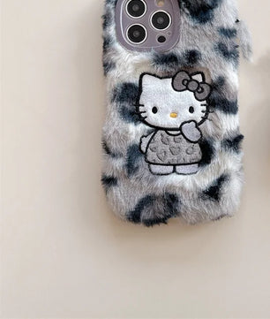 Lusy Store Luxury winter fluffy hand warmer Plush Leopard Hello Kitty phone case for iPhone 16 15 14 13Pro Max Cartoon KT Furry Wrist Strap 