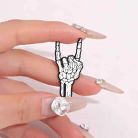 Halloween Skeletal Hand Enamel Pins Custom Rock and Roll Gesture Brooches Lapel Badges Punk Gothic Jewelry Gift for Kids Friends