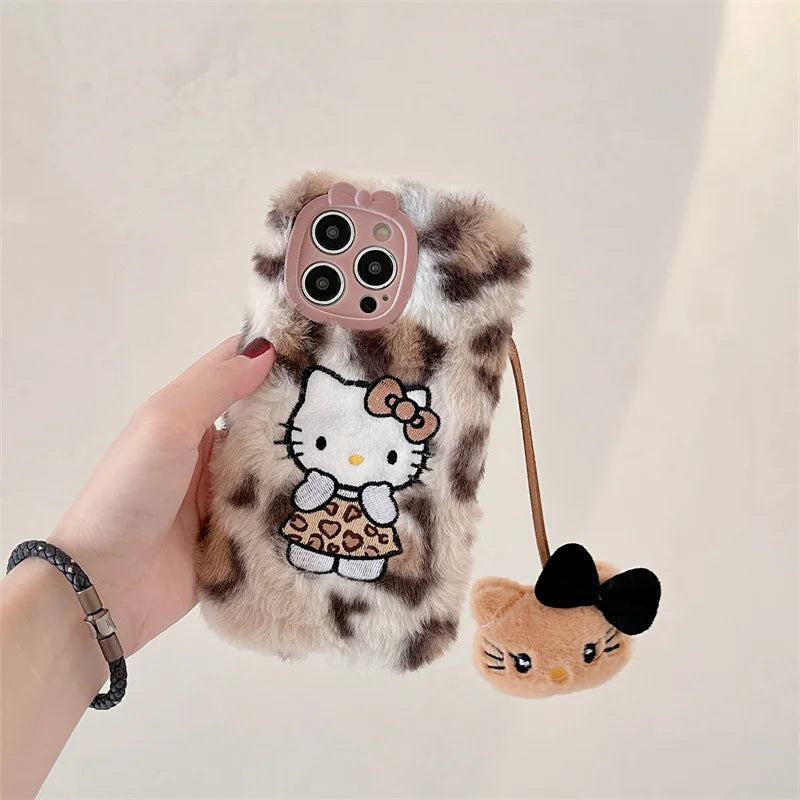Lusy Store Luxury winter fluffy hand warmer Plush Leopard Hello Kitty phone case for iPhone 16 15 14 13Pro Max Cartoon KT Furry Wrist Strap 