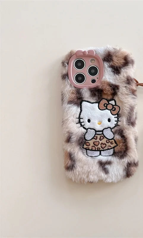 Lusy Store Luxury winter fluffy hand warmer Plush Leopard Hello Kitty phone case for iPhone 16 15 14 13Pro Max Cartoon KT Furry Wrist Strap 