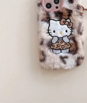 Lusy Store Luxury winter fluffy hand warmer Plush Leopard Hello Kitty phone case for iPhone 16 15 14 13Pro Max Cartoon KT Furry Wrist Strap 